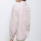 Blusa floreale con volant e bottoni