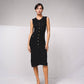 Abito midi in maglia aderente con bottoni dorati