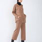 Completo in maglia oversize con pantaloni a gamba ampia