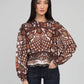 Blusa in organza stampata caramello