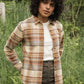 Camicia slim a quadri color latte con tasca