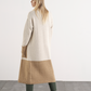 Cardigan lungo in maglia bicolore con tasche