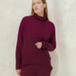 Maglione lungo dolcevita in misto cashmere con lavorazione 3D
