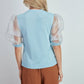 Top in viscosa con maniche in organza
