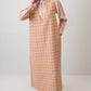 Abito pinafore in tweed a quadri con scollo a V
