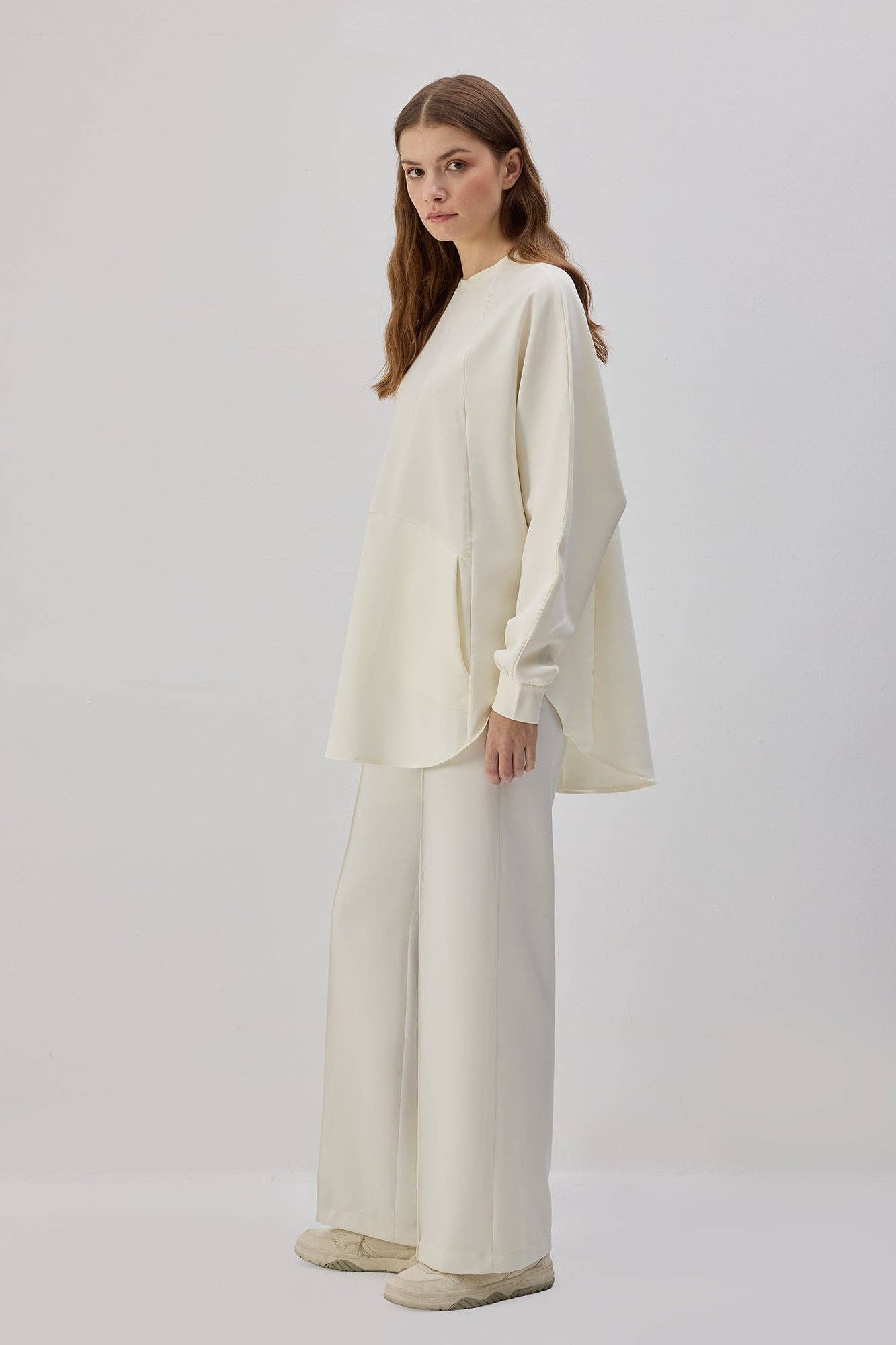 Tunica in crêpe con tasche