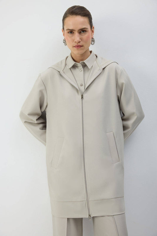 Giacca lunga con cappuccio e zip