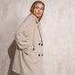 Cappotto midi doppiopetto con revers ampio