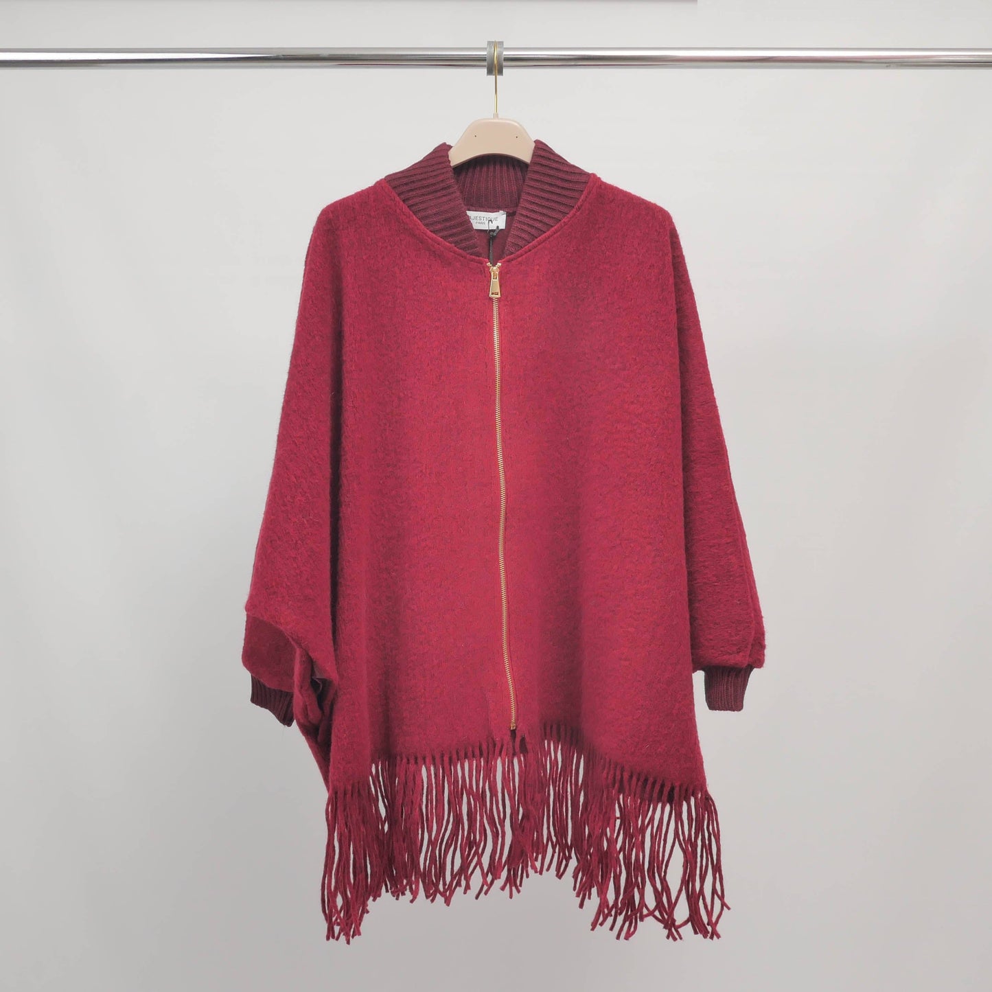 Poncho in maglia con frange e zip, maniche a pipistrello