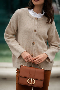 Cardigan in maglia beige con bottoni