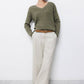 Maglione in maglia strutturata con scollo a V
