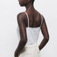 Top basic con scollo a V e spalline sottili