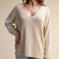 Maglione in tweed glitter con doppio scollo a V