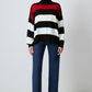 Maglione tunica a righe con collo alto