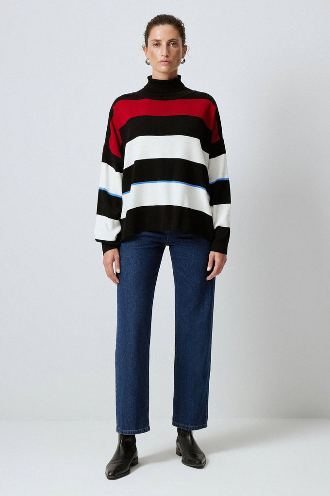 Maglione tunica a righe con collo alto