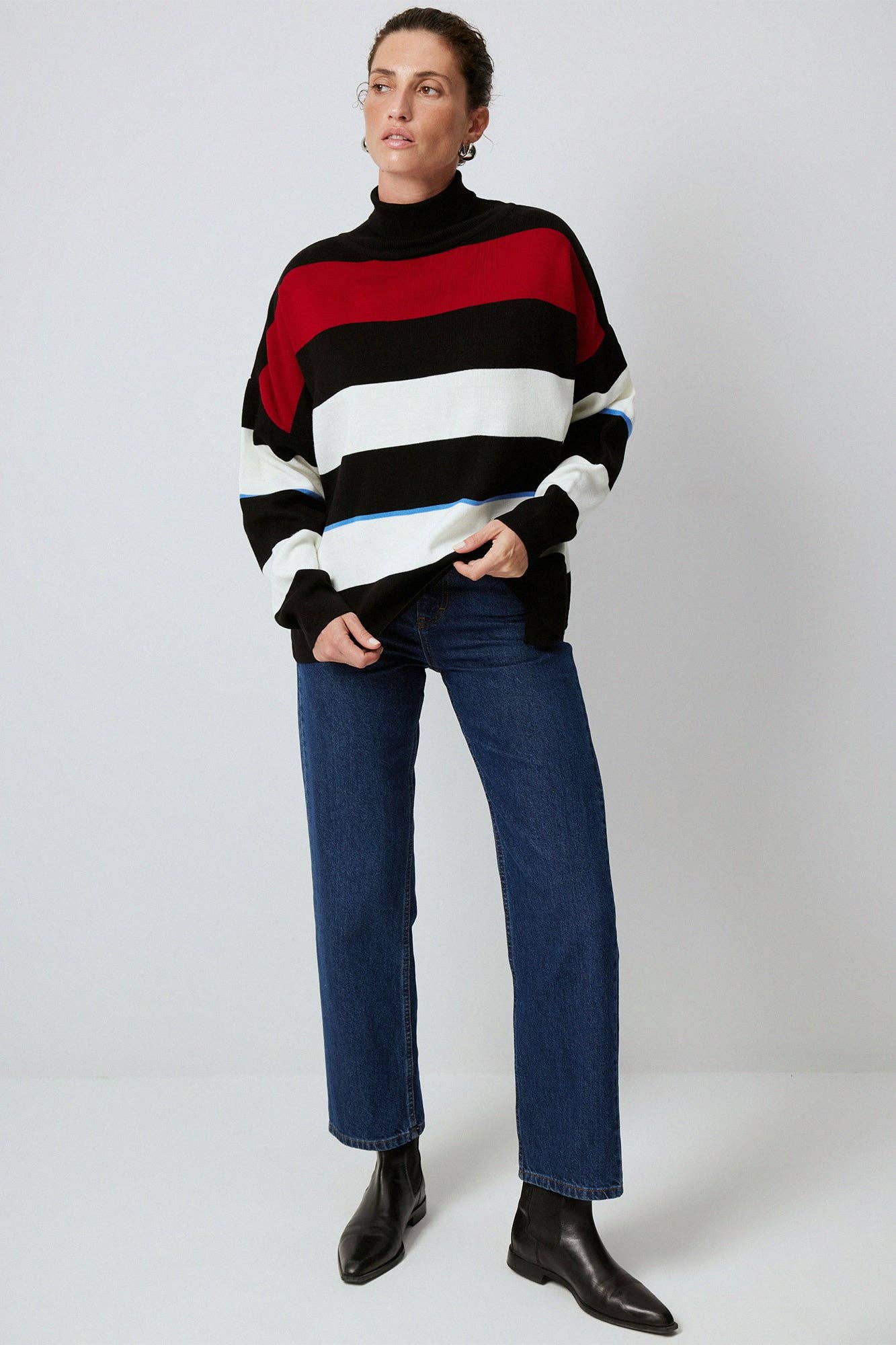 Maglione tunica a righe con collo alto