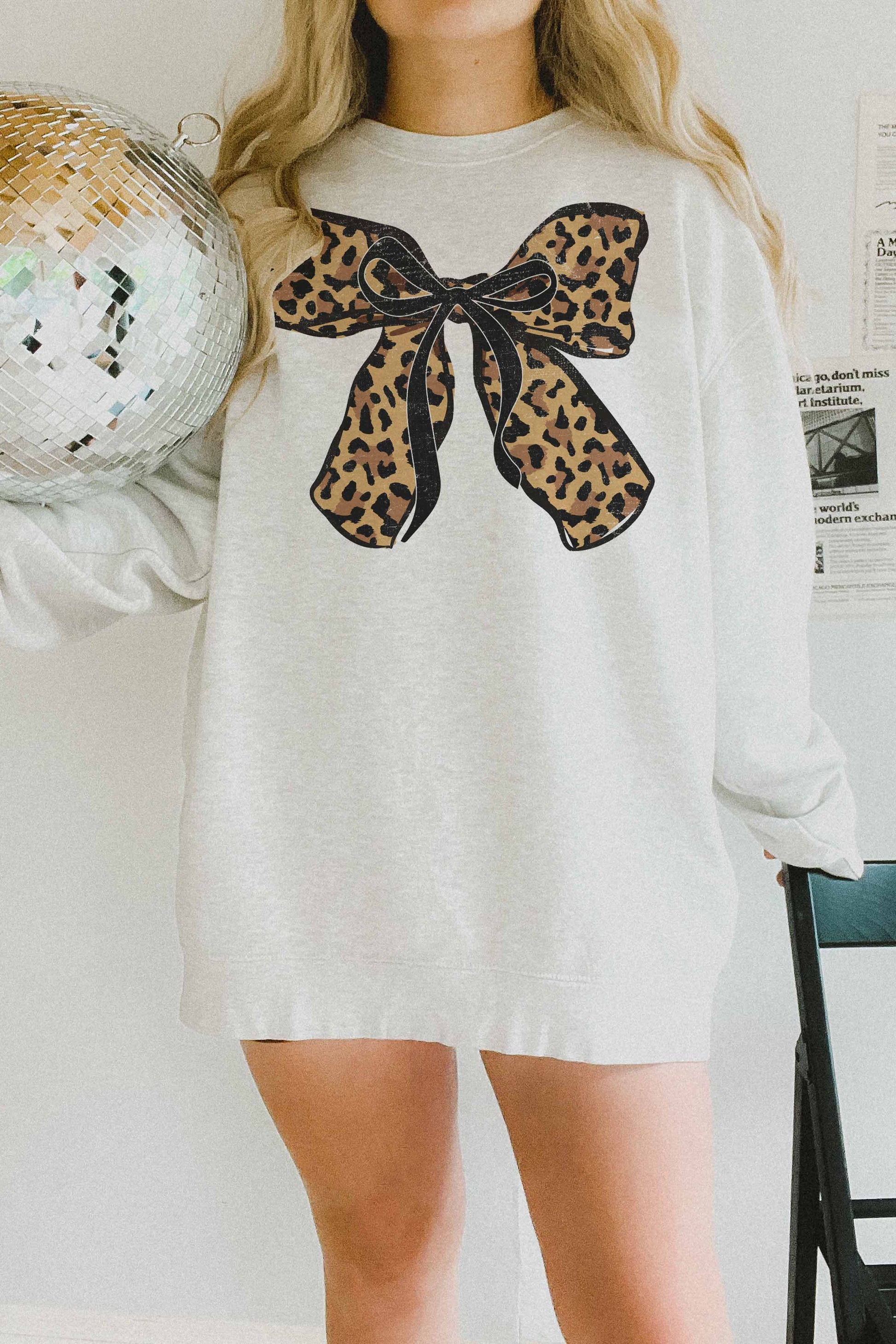 Felpa oversize con fiocco leopardato