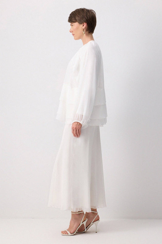 Blusa in chiffon a balze stratificate elegante