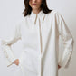 Camicia a righe crema con polsini maxi
