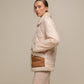 Giacca trapuntata bicolor con profili teddy e zip