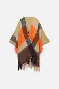 Poncho a quadri con frange