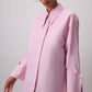 Camicia a righe rosa con polsini ampi