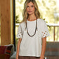 T-shirt in cotone con maniche ricamate