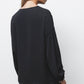 Blusa nera con coulisse in vita