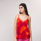 Top stampato con pizzo e scollo a V