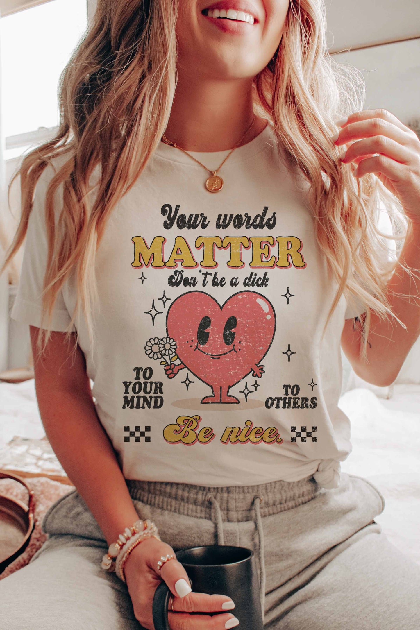 T-shirt grafica "Be Nice"