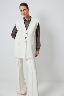 Gilet in crêpe con bottoni