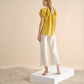 Blusa in lino con volant