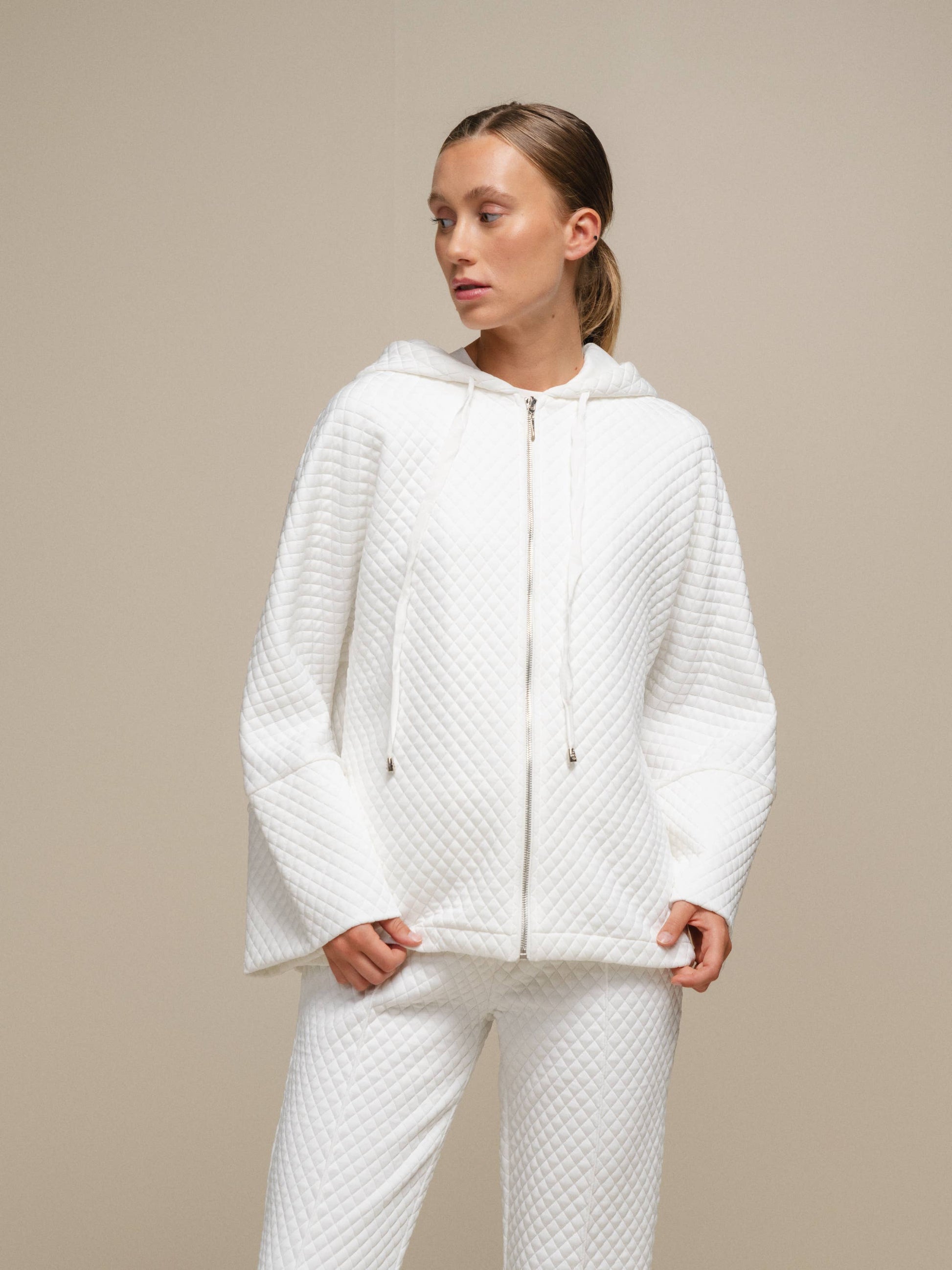 Cappotto donna trapuntato con cappuccio e zip
