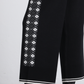 Pantaloni a palazzo jacquard con motivo geometrico
