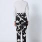 Pantaloni in gabardina con stampa geometrica