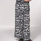 Pantaloni satinati a vita alta con stampa