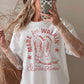 T-shirt oversize con grafica western fatta a mano