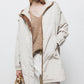 Parka lungo con cappuccio e tasche