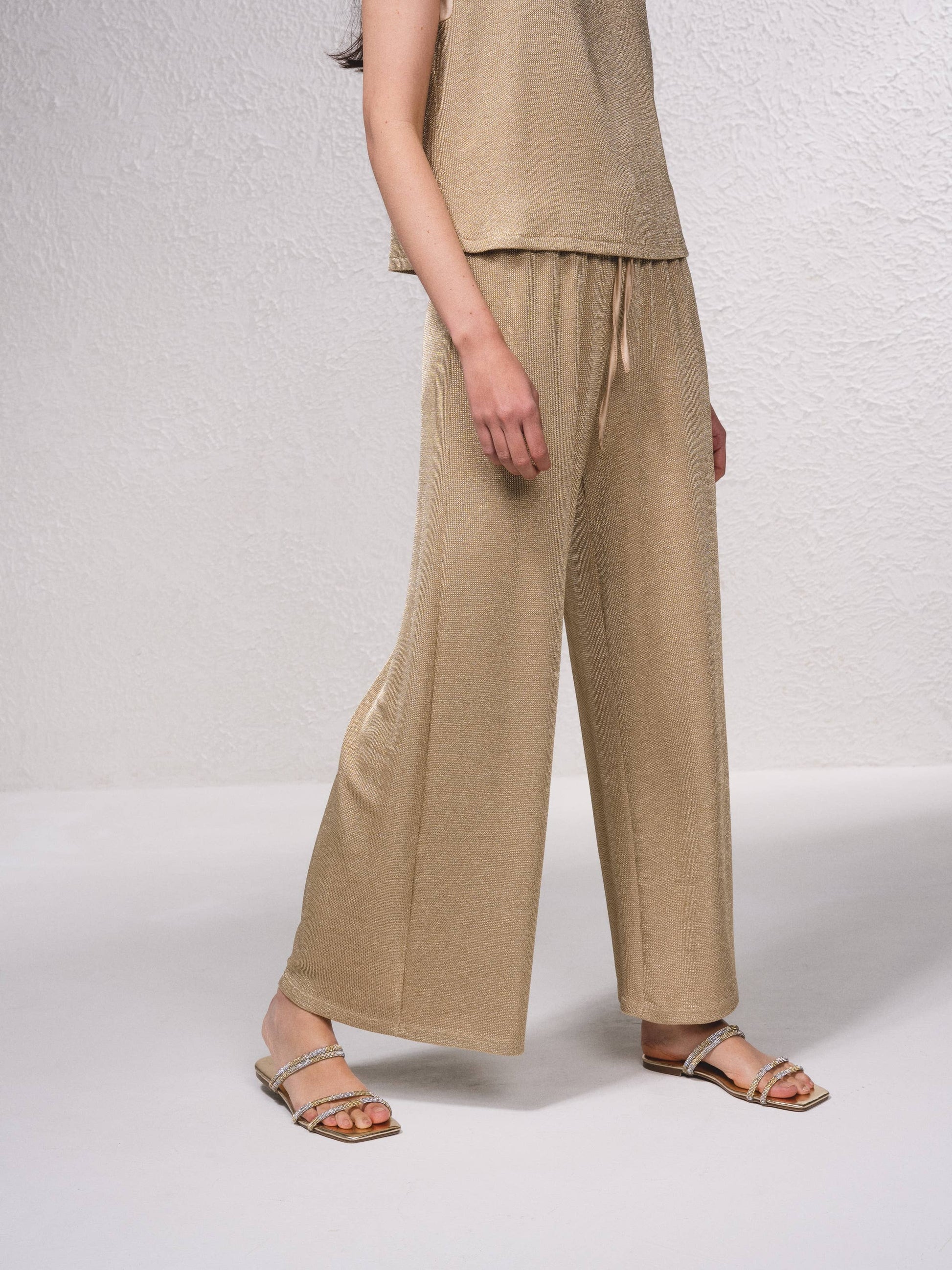 Pantaloni palazzo in lurex con coulisse