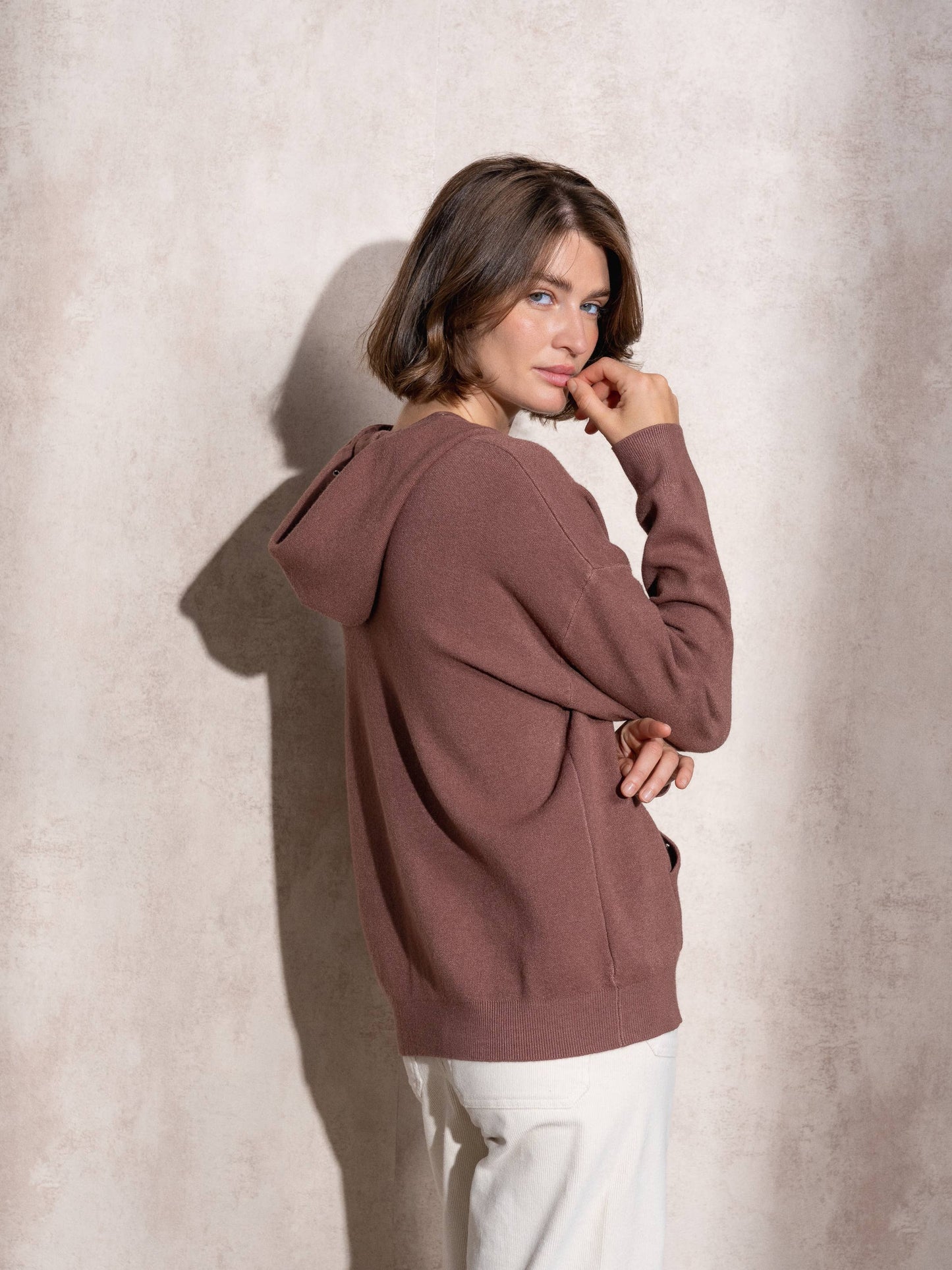 Felpa con cappuccio in maglia traforata da donna