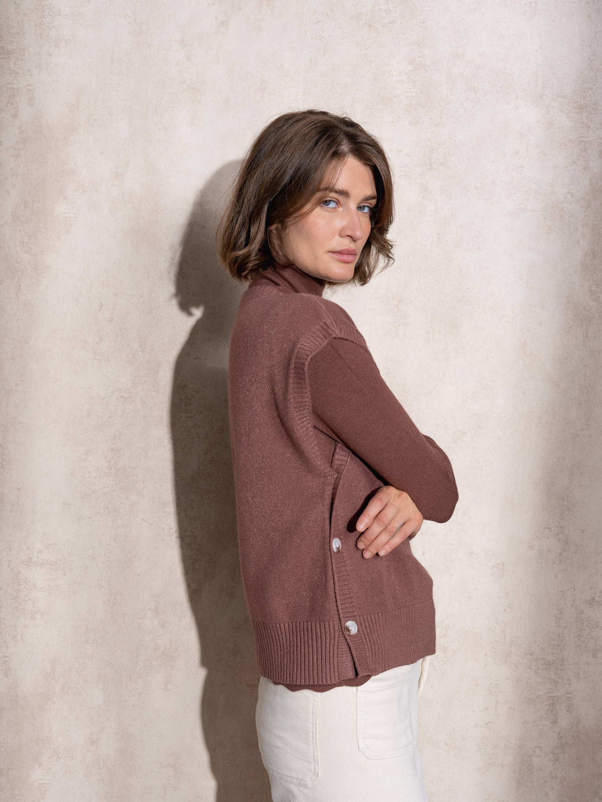 Gilet in maglia senza maniche con bottoni laterali