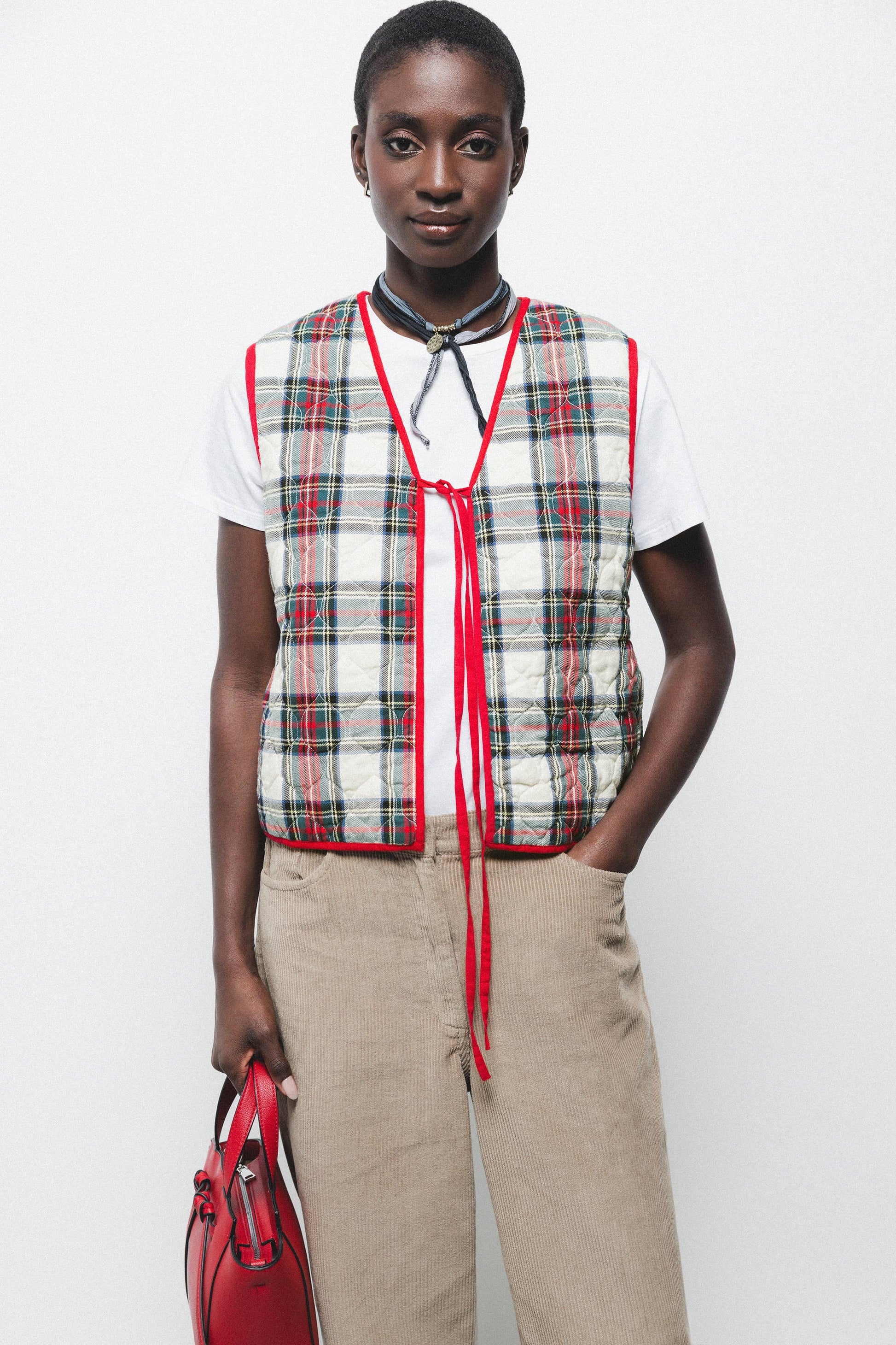 Gilet trapuntato tartan con scollo a V e laccio frontale