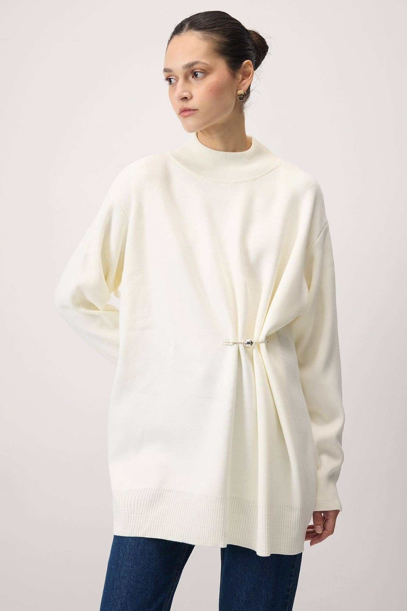 Tunica in maglia con accessorio metallico