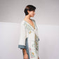 Vestito tunica corto in cotone con ricami a contrasto