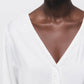 Blusa con paillettes e scollo a V