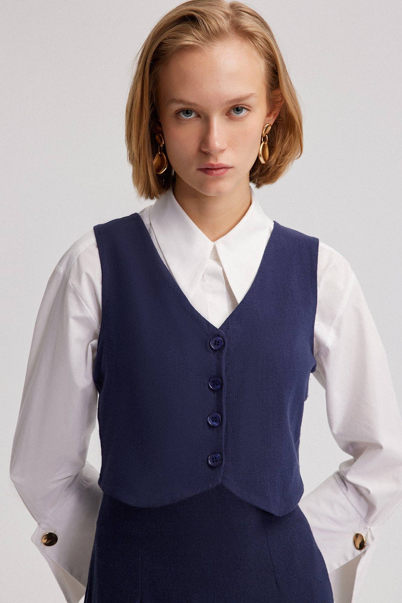 Gilet in cotone testurizzato con bottoni blu navy