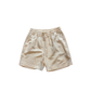 Shorts in lino color sabbia con logo ricamato