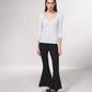 Cardigan in maglia a coste con catene dorate