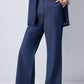Set in denim con gilet e pantaloni con cintura