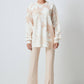 Maglione oversize beige con maxi fantasia floreale